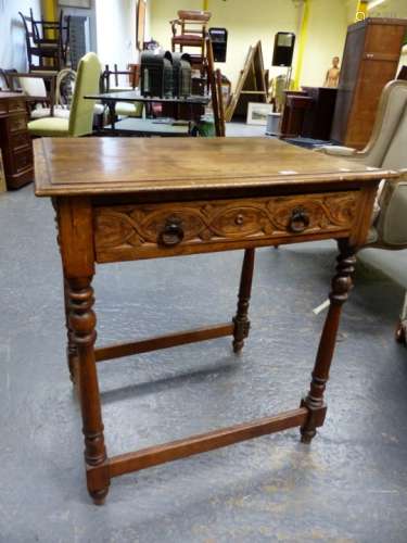 AN 18th.C.STYLE OAK SIDE TABLE WITH CARVED FRONT FRIEZE DRAWER ON TURNED LEGS UNITED BY STRETCHER.