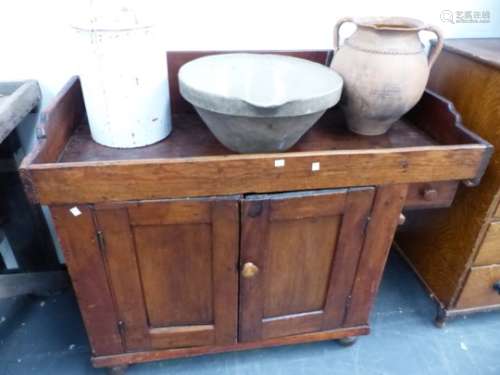 A 19th.C.AMERICAN PINE DRY SINK WITH RAISED BACK OVER PANEL DOORS AND SMALL DRAWER. 113 x 52 x H.