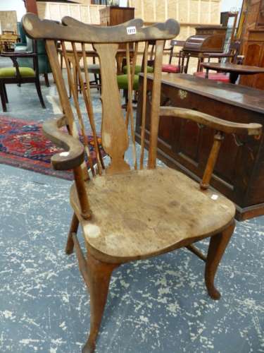 AN UNUSUAL COUNTRY ARMCHAIR WITH SPINDLE BACK AND SHAPED TOP RAIL ON CABRIOLE FORELEGS TOGETHER WITH