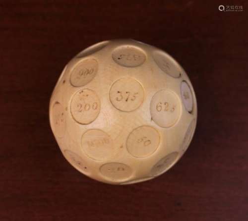 A 19th Century Ivory Teetotum Gambling Ball, engraved with numbers in recessed roundels, 2½