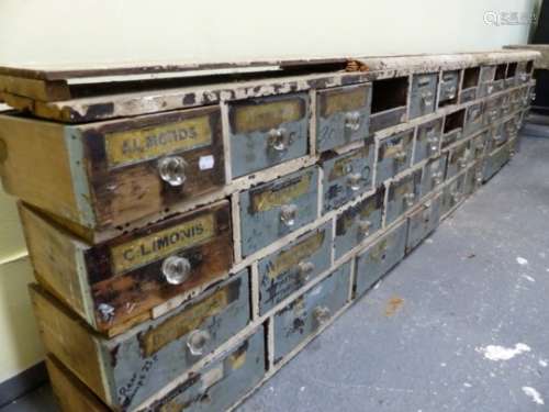 AN IMPRESSIVE BARN FIND RUN OF THIRTY EIGHT APOTHECARY DRAWERS, SOME WITH ORIGINAL LABELS. W.275 x