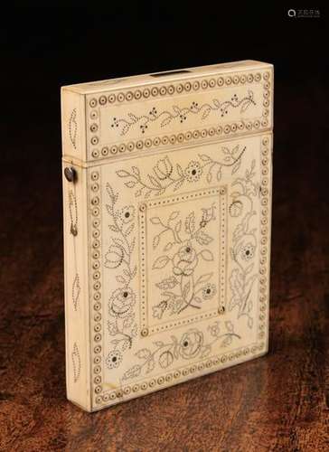 A Victorian Ivory Card Case embellished with piqué work sprays of flowers and foliage framed by a