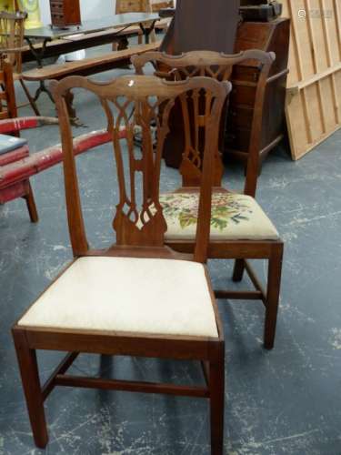 A SET OF SIX CARVED WALNUT COUNTRY GEORGIAN DINING CHAIRS WITH GOTHIC REVIVAL BACK SPLATS. (ONE