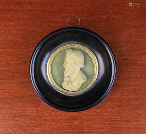 A Small Pierre de Munich Cameo intricately carved with the profile bust of a bearded subject