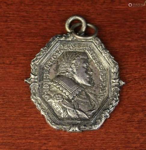 A German 17th Silver Metal Pendant Medallion emblazoned with the head of a nobleman in an octagonal