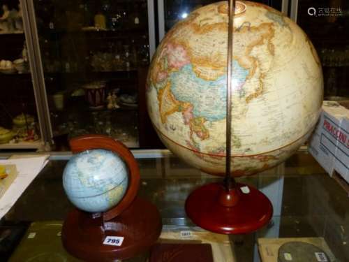 A REPLOGLE TWELVE INCH TERRESTIAL GLOBE TOGETHER WITH A 12cms DIAMETER ENGLISH GLOBE FOR THE