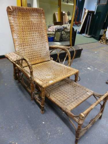 AN ANTIQUE BAMBOO CONSERVATORY CHAIR WITH ADJUSTABLE BACK AND FOOTREST.