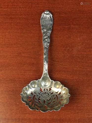 A Tiffany Silver Sifting Spoon.