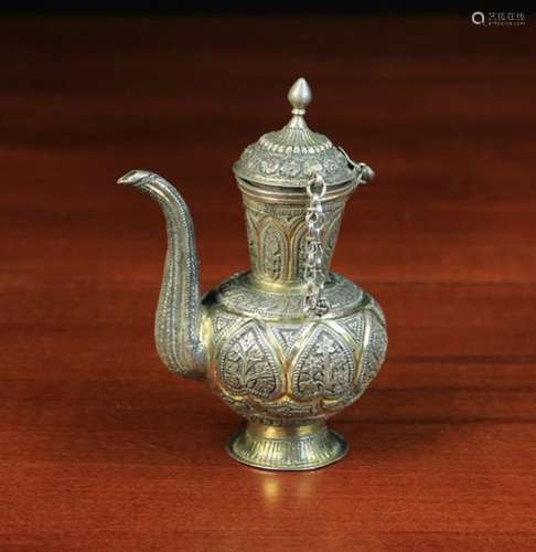 A Small Ottoman Silver Metal & Gilt Ewer having a body on a raised foot,