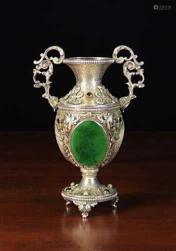 A 19th Century Ornamental Silver Metal Twin-handled Ewer elaborately decorated with cast & chased