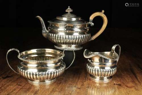 A George III Silver Teaset hallmarked London 1815-16 with maker's punch for Michael Starkey.