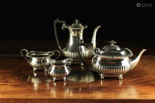 A Silver Four-part Teaset hallmarked London 1910 with William Hutton & Sons Ltd maker's punch.