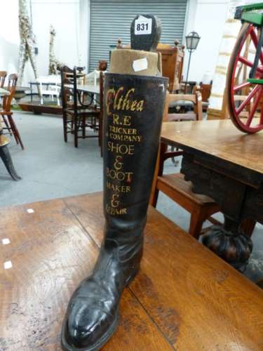 A VINTAGE LEATHER RIDING BOOT WITH HAND PAINTED ADVERTISING ELTHEA-R.E.TRICKER & Co SHOE AND BOOT