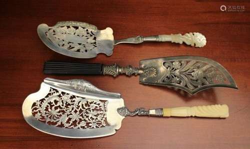 Three 19th Century Continental Silver Fish Servers with intricately pierced and engraved blades;