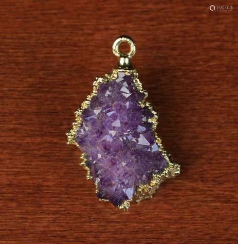 A Small Gold Mounted Amethyst Cluster of irregular form, 1½