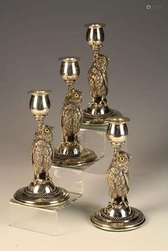 A Set of Four Fine Silver Plated Owl Candle-holders.