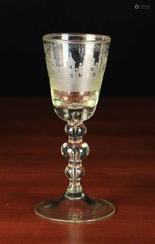 An 18th Century Glass Goblet engraved with inscription 'HET WELVAEREN VAN ONSE FABRIK' (The