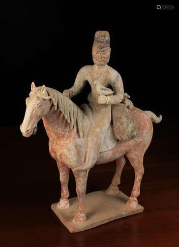 A Fine Tang Dynasty Painted Pottery Horse & Rider (618-906 AD).