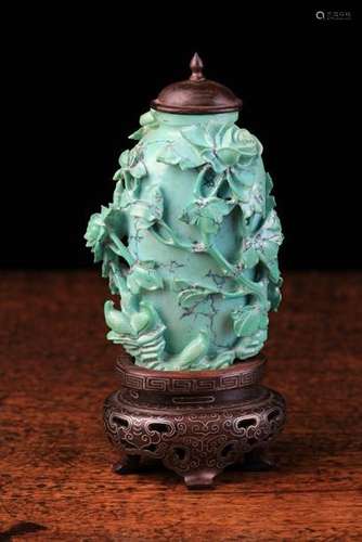 A Small Chinese Carved Turquoise Vase with hardwood lid & stand.