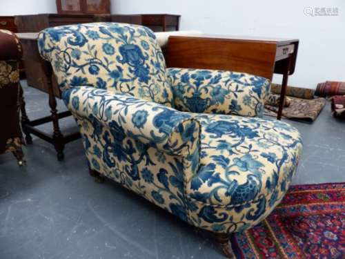 A VICTORIAN DEEP SEAT ARMCHAIR OF HOWARD & SONS DESIGN WITH SHORT TURNED FORELEGS, RECENTLY RE-