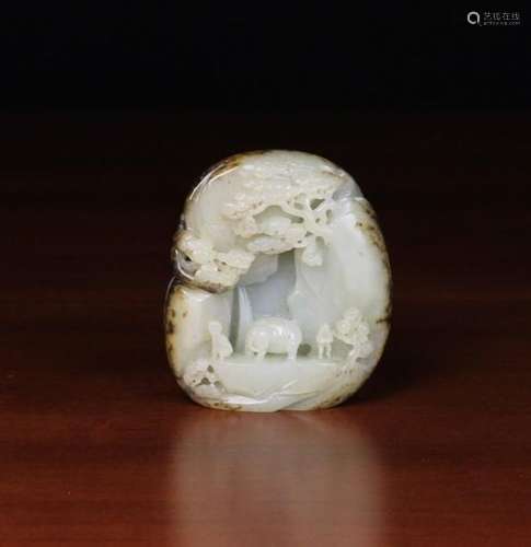 A Fine 18th Century Chinese Pale Celadon Jade Pebble Carving with dark inclusions to the perimeter,