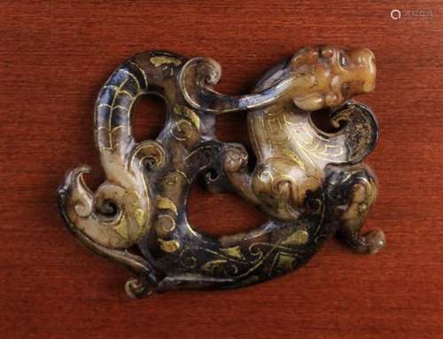 A Fabulous Chinese Two-Colour Brown Jade Carving of a Conjoined Dragon & Phoenix enriched with gold