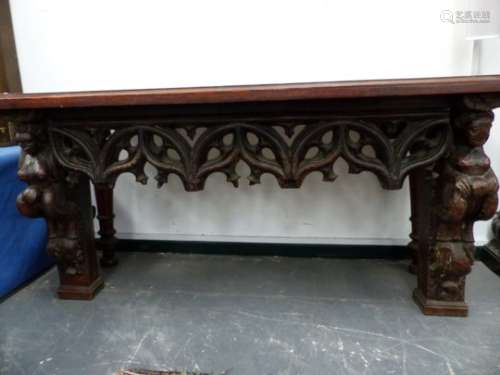 A 17th.C.AND LATER OAK CONSOLE TABLE RECONSTRUCTED USING ECCLESIASTICAL ELEMENTS FROM A WARTIME