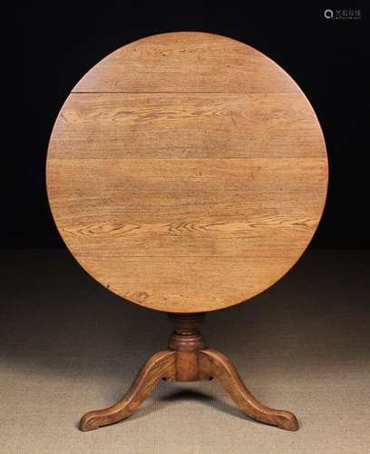 A Late 19th Century Tilt-top Tripod Table.