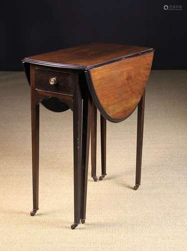 A Small Edwardian Red Walnut Drop Leaf Table.