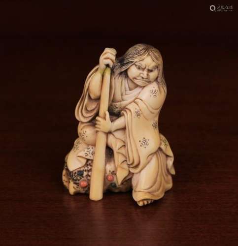 A Fine 19th Century Netsuke carved in detail with depiction of Shunkosai with staff on a rockwork