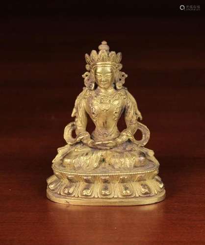 A Small 19th Century Gilt Metal Buddha, 4