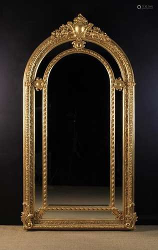 A Large Arch-topped Gilt Wall Mirror.