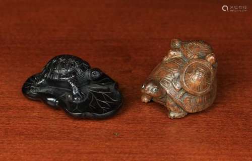 Two Japanese Carved Hardwood Netsukes: One in the form of a tortoise on a lotus leaf, 2½