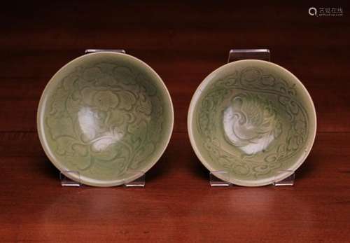 Two Similar Yaozhou Kiln Type Bowls decorated with undulant sprays of flowers & foliage.