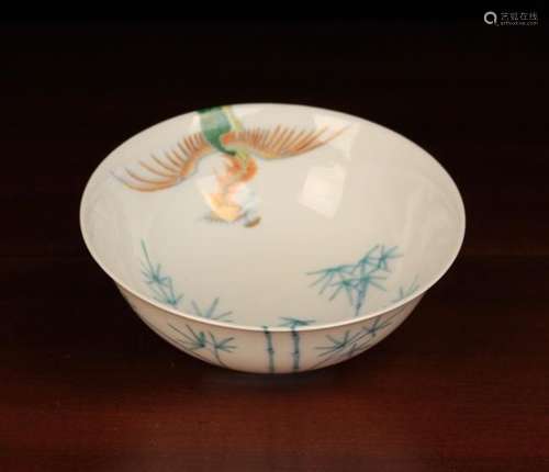 A Chinese Republican Period Porcelain Bowl decorated with a phoenix and bamboo and having a six