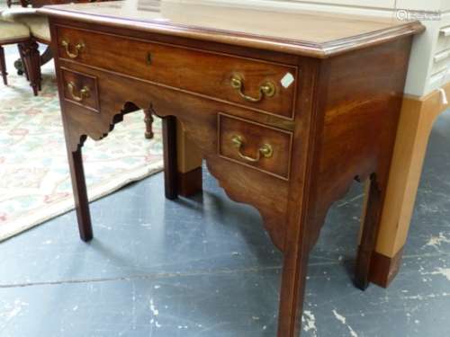 A MAHOGANY LOW BOY, THE CYMA EDGED TOP OVER A LONG DRAWER AND TWO SHORT DRAWERS ON SQUARE