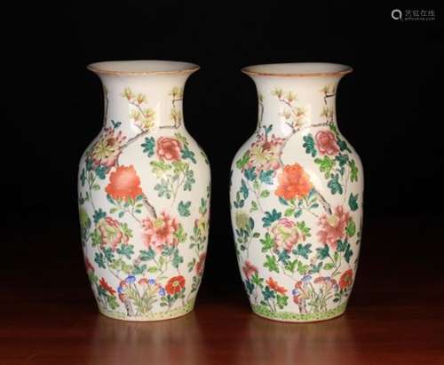 A Pair of Chinese Baluster Vases painted in polychrome enamels with tree peonies and magnolia,