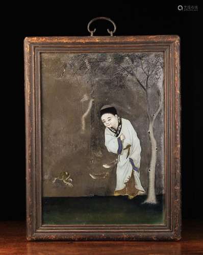 An Antique Chinese Reverse Painted Mirror depicting Lui Hai;