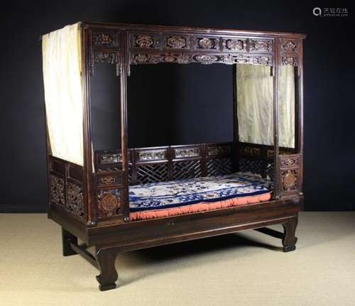 An Antique Chinese Canopy Bed.