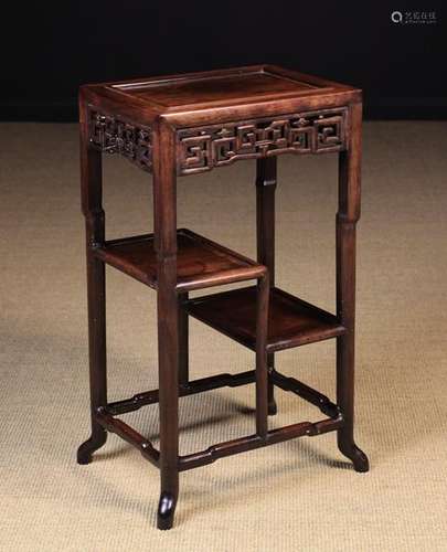 A Late 19th/Early 20th Century Chinese Tiered Hardwood Stand.