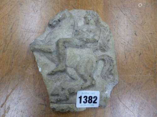 A MOULDED RELIEF OF AN HELLENISTIC SOLDIER ON A REARING HORSE. H 18cms.