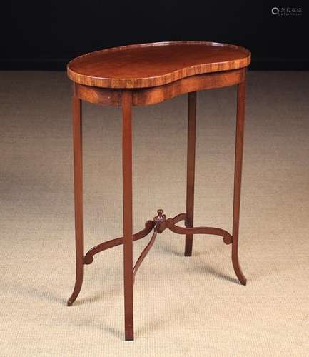 An Edwardian Kidney-shaped Occasional Table.