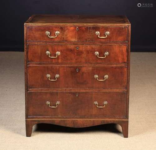 A Fine George III Mahogany Veneered Chest of Drawers with decorative inlaid top, Circa 1790.