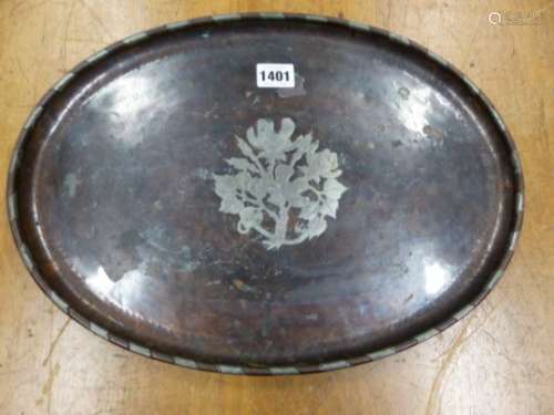ATTRIBUTED TO HUGH WALLIS (1871-1943) AN OVAL COPPER TRAY WITH PEWTER BUNCH OF FLOWERS CENTRALLY.
