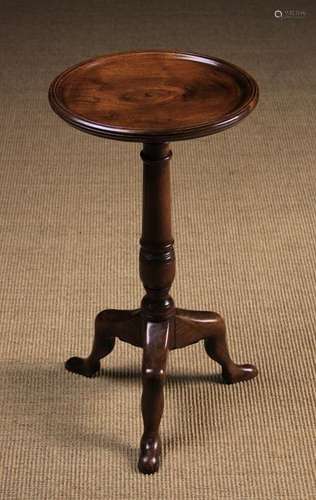 A Carved Walnut 'Manx' Style Table.