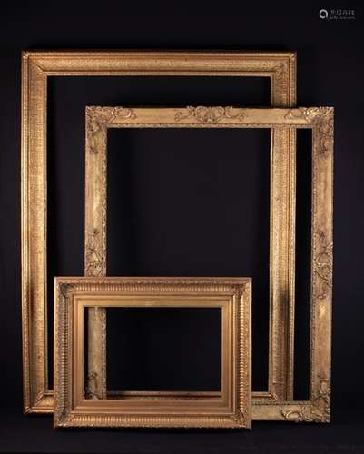 Three Gilt Picture Frames: A Large 19th Century Cavetto moulded frame (A/F) decorated with small