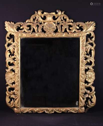 A Large Rectangular Wall Mirror in an 18th Century open-carved giltwood frame of undulating foliate