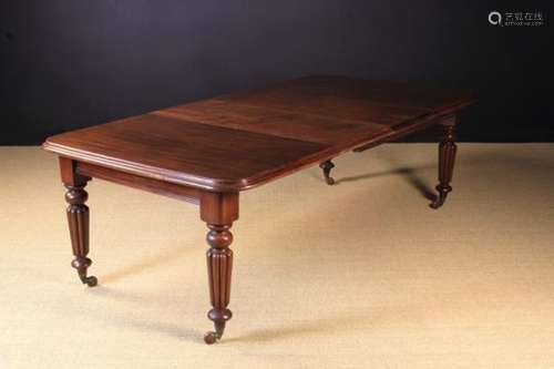 A Victorian Mahogany Wind-out Dining Table.