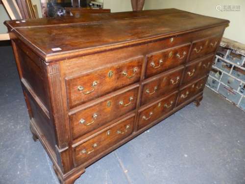 AN EARLY 19th.C.OAK AND MAHOGANY CROSSBANDED LANCASHIRE MULE CHEST STANDING ON OGEE BRACKET FEET