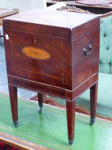 A REGENCY MAHOGANY AND INLAID CELLARETTE ON SQUARE TAPERED LEGS WITH BRASS CASTERS. 41 x 29 x H.